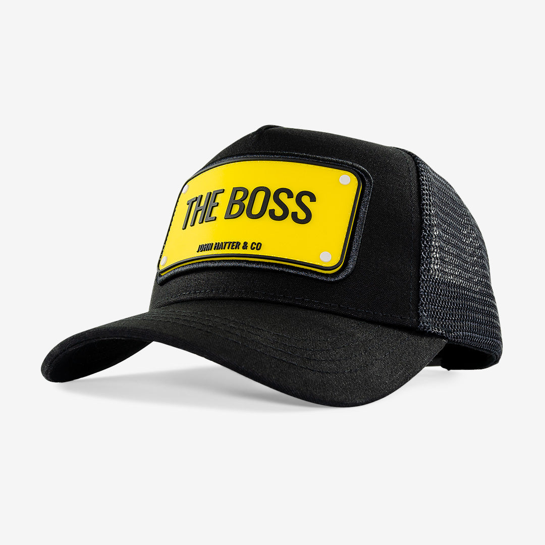Svart keps i gummerat material med brodyr – THE BOSS Rubber Cap