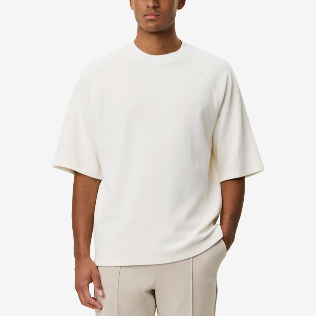 Sully Towel T-shirt i Light Ivory med handdukstextur, raglanärmar och ton-i-ton-brodyr bak i nacken