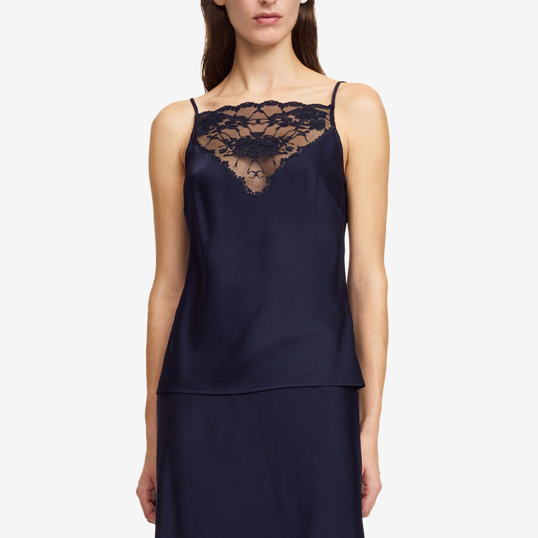 Topp i färgen Night Sky tillverkad i acetat och polyester med elegant glans.