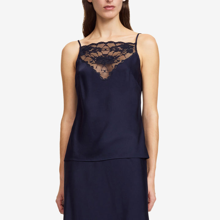 Topp i färgen Night Sky tillverkad i acetat och polyester med elegant glans.