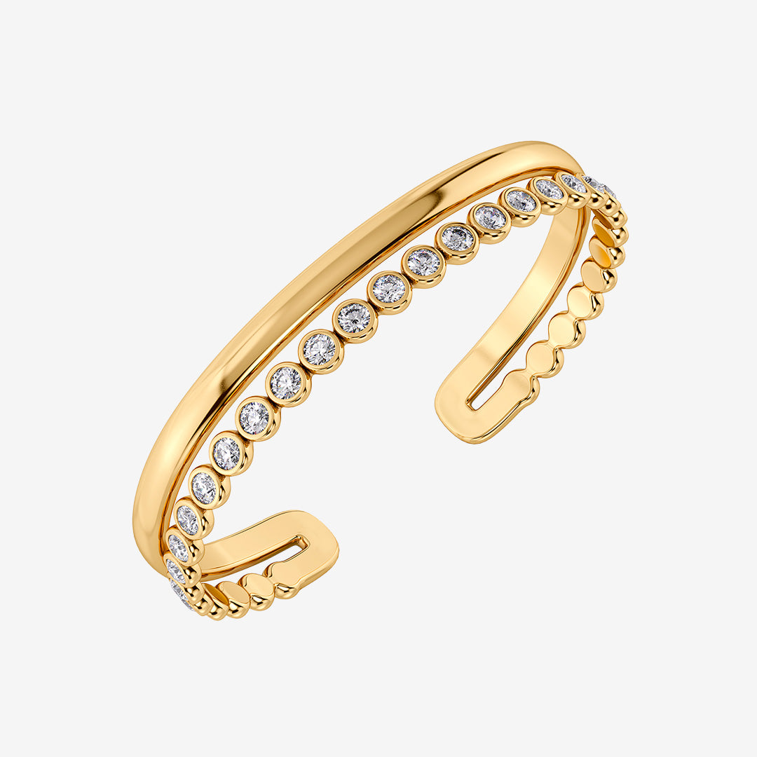 Grace Bangle Gold armband i guldpläterat rostfritt stål med glittrande stenar