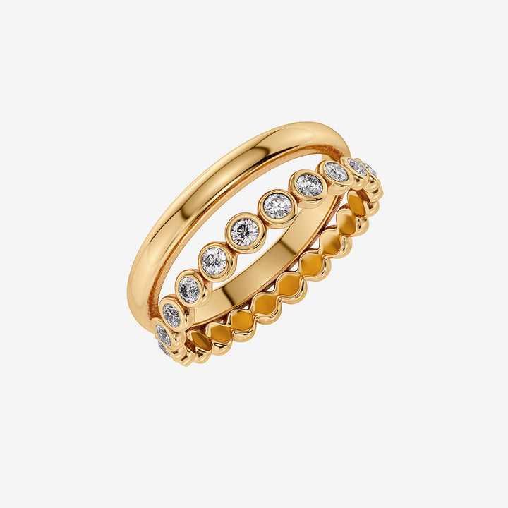 Grace Ring Gold ring i guldpläterat rostfritt stål med två skenor och glittrande stenar