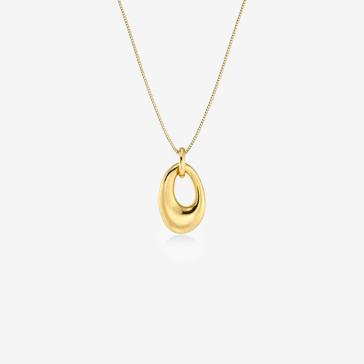 Guldpläterat halsband med asymmetriskt skulpturalt hänge och fasettslipad ankarkedja