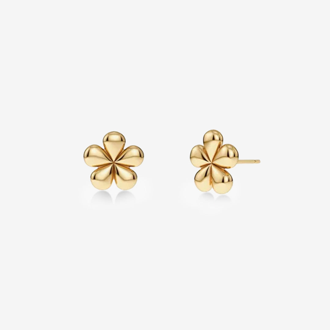 Små guldpläterade studs med tusensköna motiv i rostfritt stål