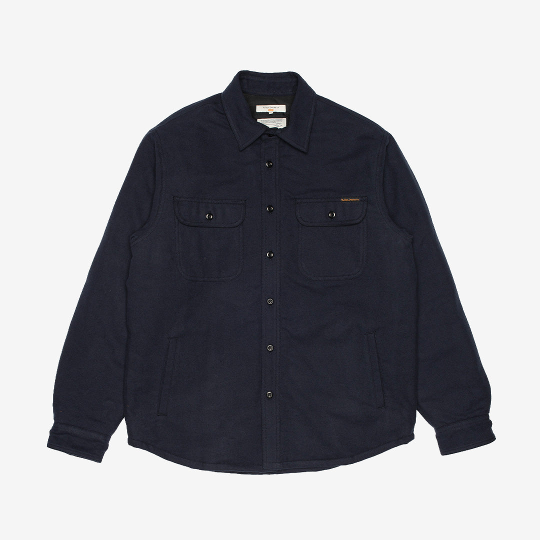 Nudie Jeans Glenn Padded Shirt vadderad flanellskjorta för herr i Blueberry.