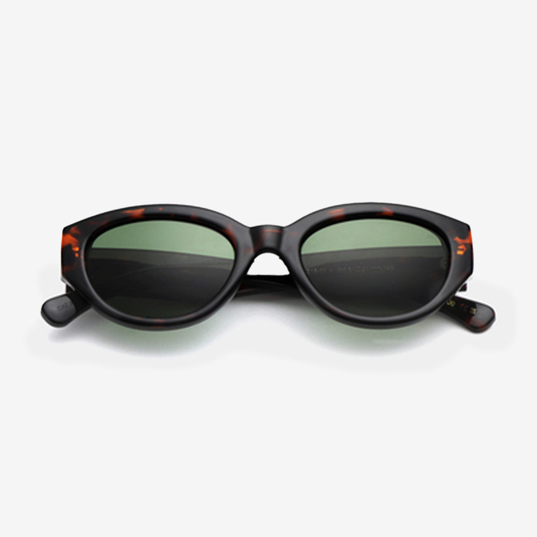 WINNIE Demi Tortoise solglasögon med ovala linser och kraftig sköldpaddsmönstrad ram