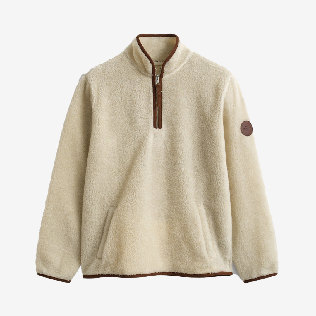 Gant Half Zip Fleece i Cream med halv dragkedja, framfickor och elastiska kanter