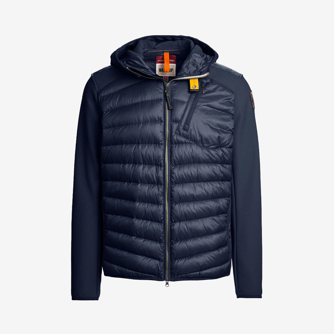 Nolan hybridjacka med huva i färgen Blue Navy, i stretch och dun från Warm Up-serien