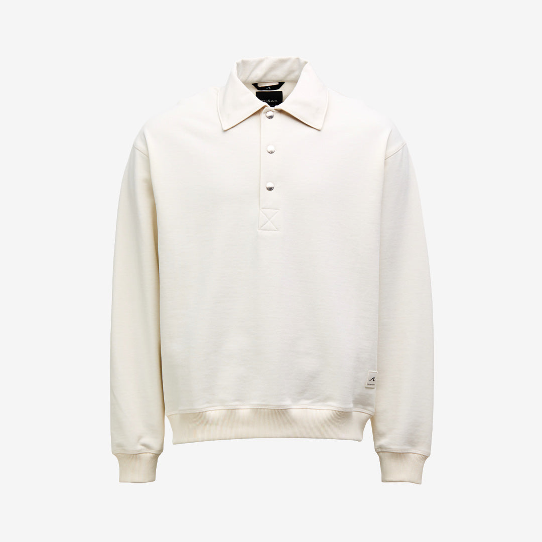 Cesar Equipment Cleggan Half Button Sweat Polo Off White sweat polo i bomullsblandning med halvknäppning och nylondetaljer