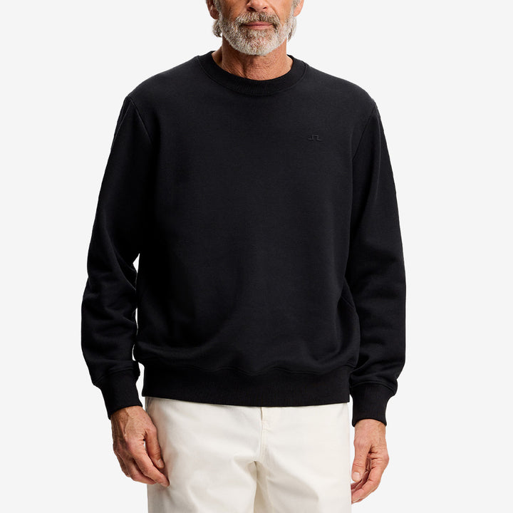 Svart Alpha Crew Neck sweatshirt i mjuk jerseysweat sedd framifrån