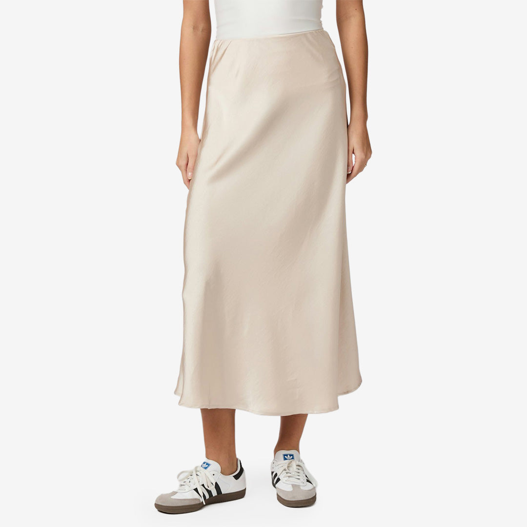 Bovary skirt från Neo Noir i champagnefärgad satin med resår i midjan