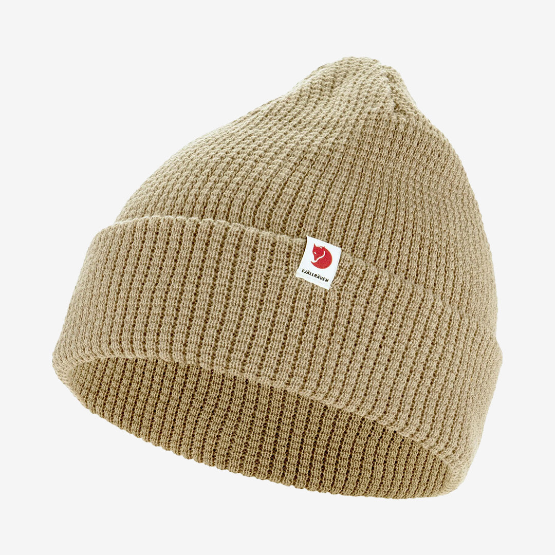 Fjällräven Tab Hat i beige – mössa i återvunnen polyester med uppvikt kant