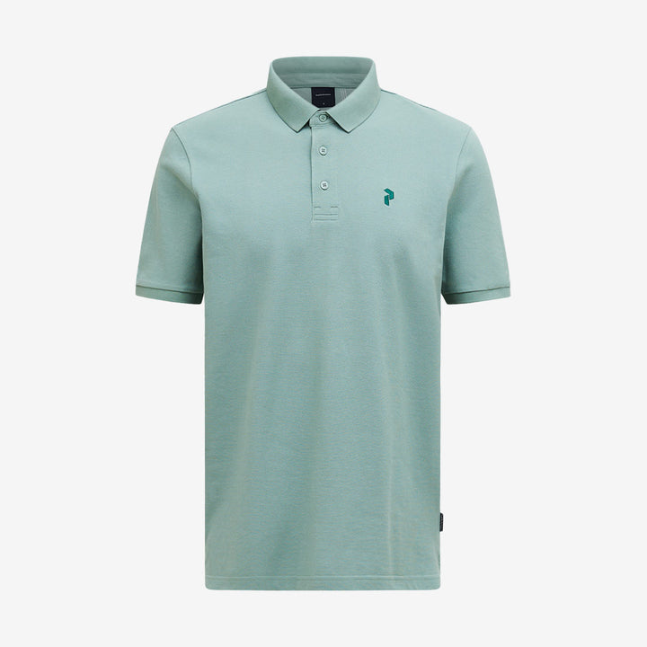 Grön pikétröja från Peak Performance för herr i mjuk bomullspiké med klassisk design.