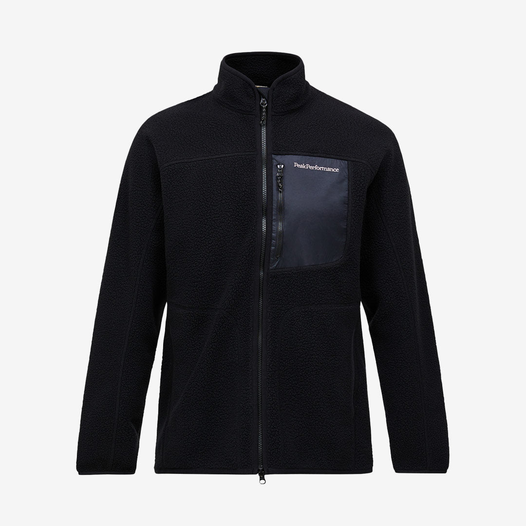 Pilejacka med dragkedja från Peak Performance för herr i svart med ståkrage och praktiska fickor.