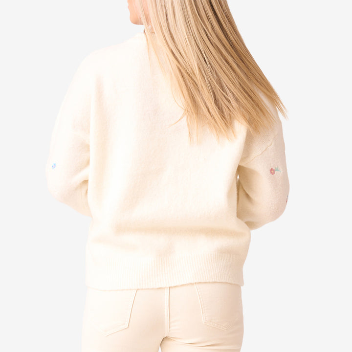 Stickad tröja  m blommor