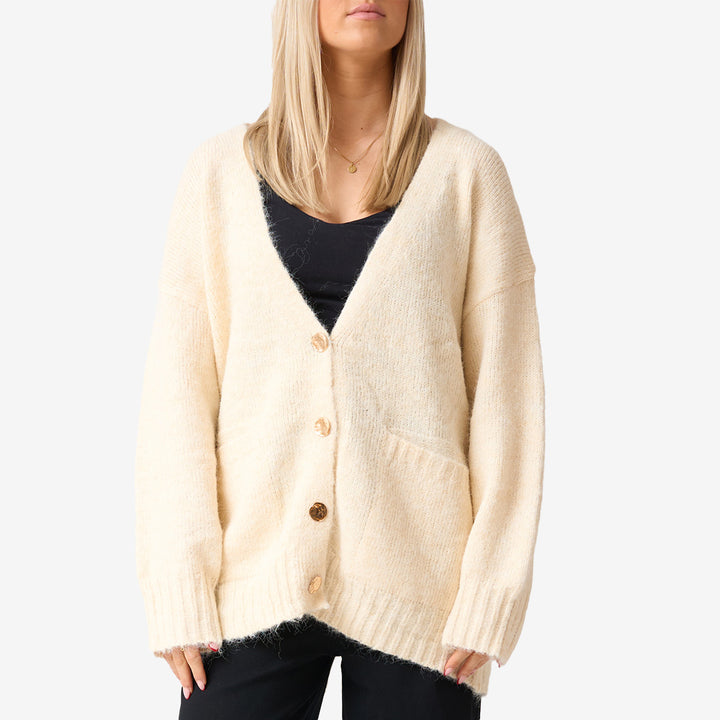 JP-7985 stickad cardigan i beige för dam – öppen modell med mjuk struktur