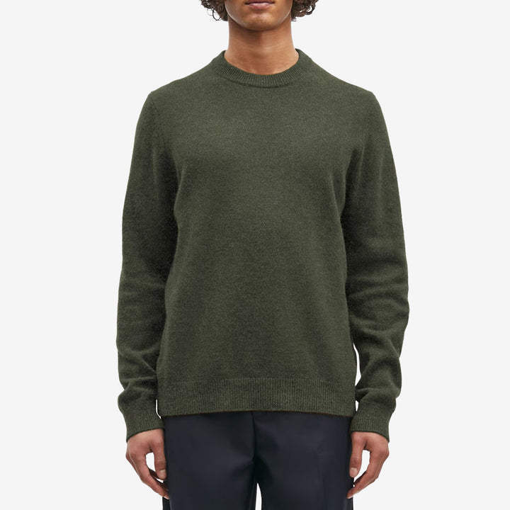 Samsøe Samsøe Isak Knit Sweater Forest Night, mörkgrön stickad tröja i merinoull med lång ärm och rund halsringning.