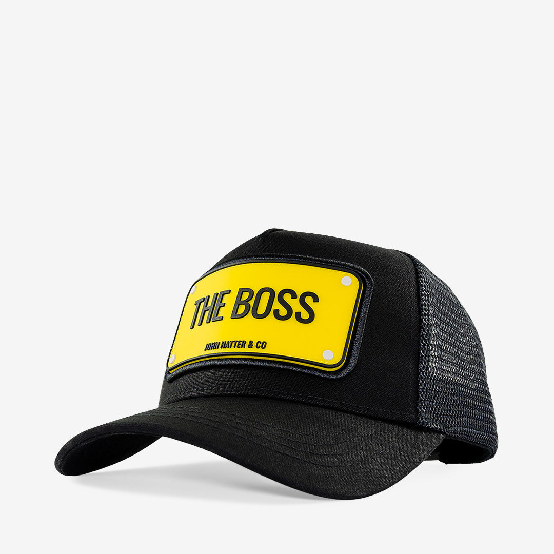 Svart keps i gummerat material med brodyr – THE BOSS Rubber Cap