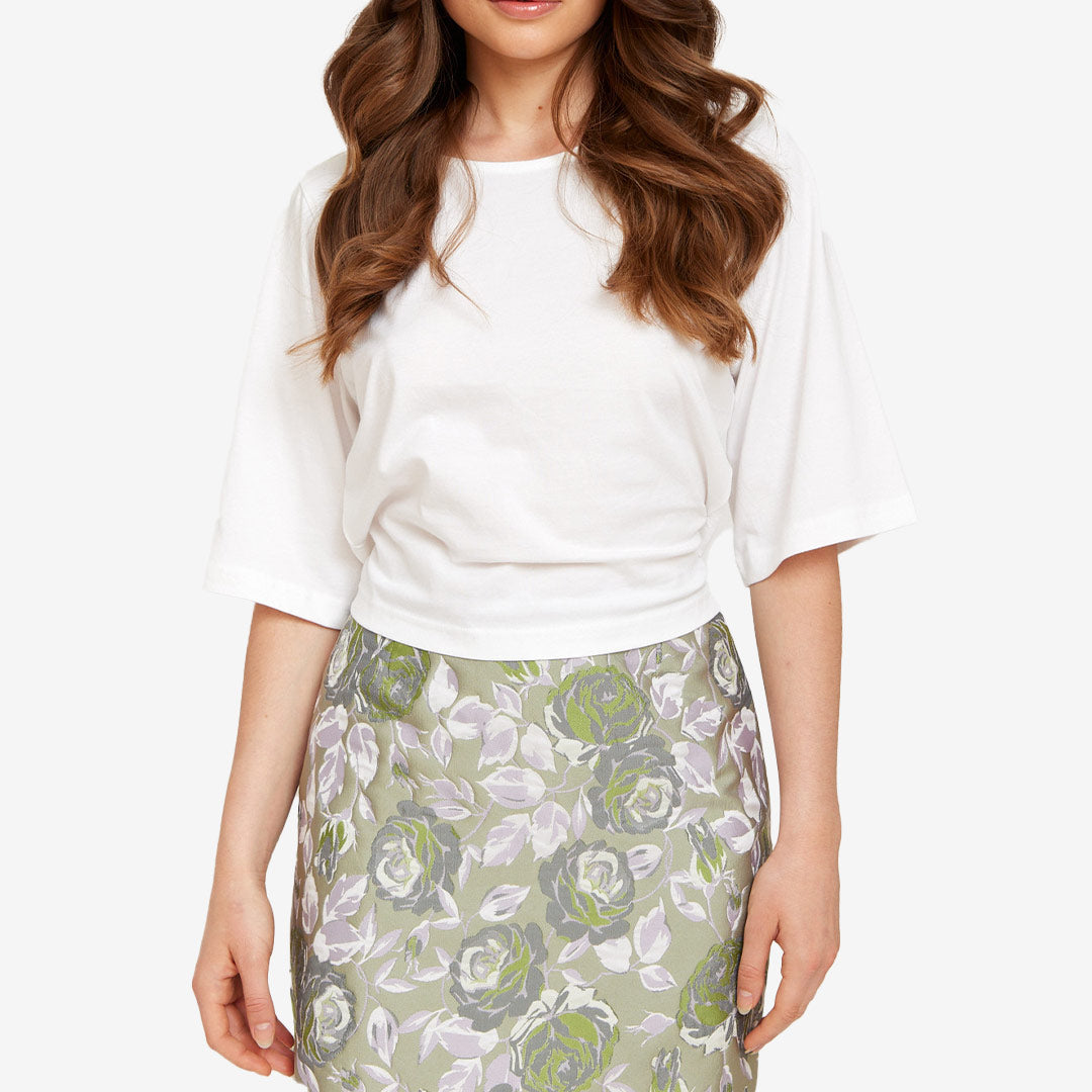 Vit topp från Rut & Circle för dam i bomull med kort ärm och knytband i ryggen.