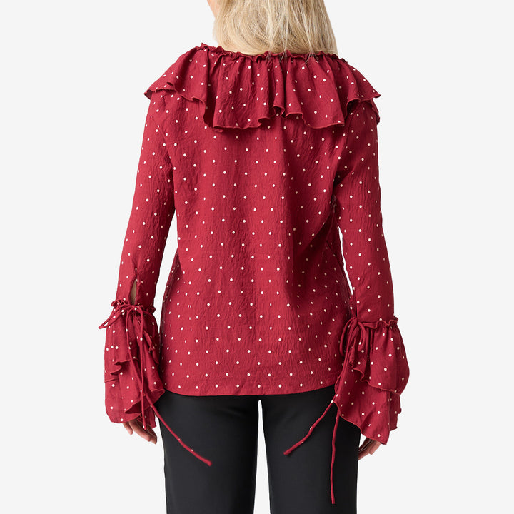 Blus prickig m volang